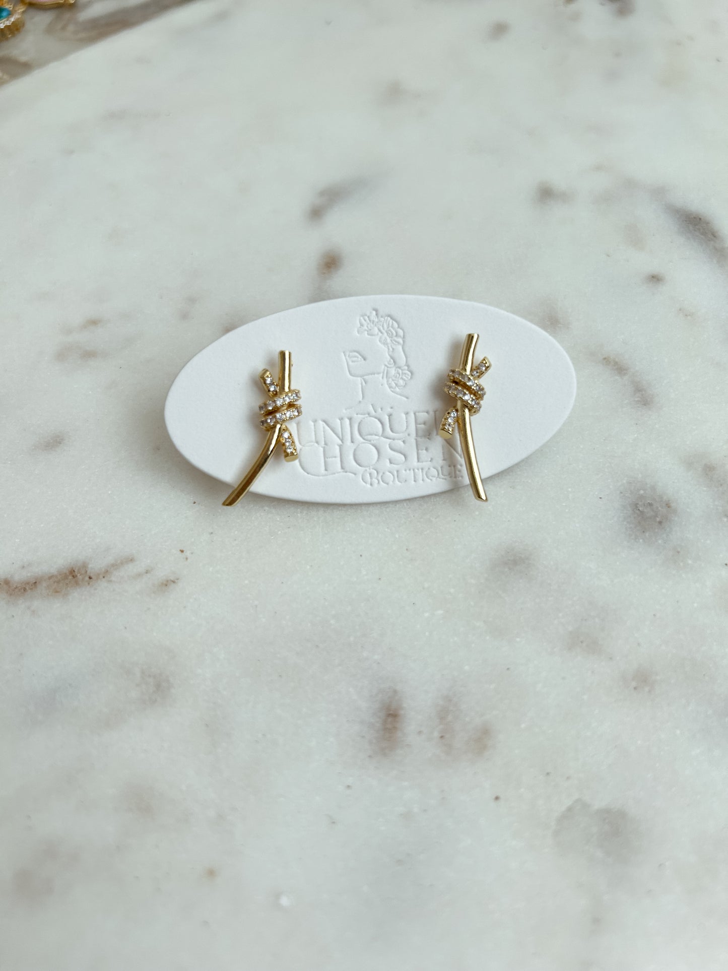 A cord of three strands earrings