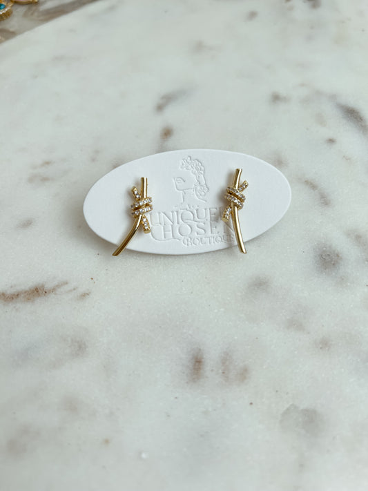 A cord of three strands earrings