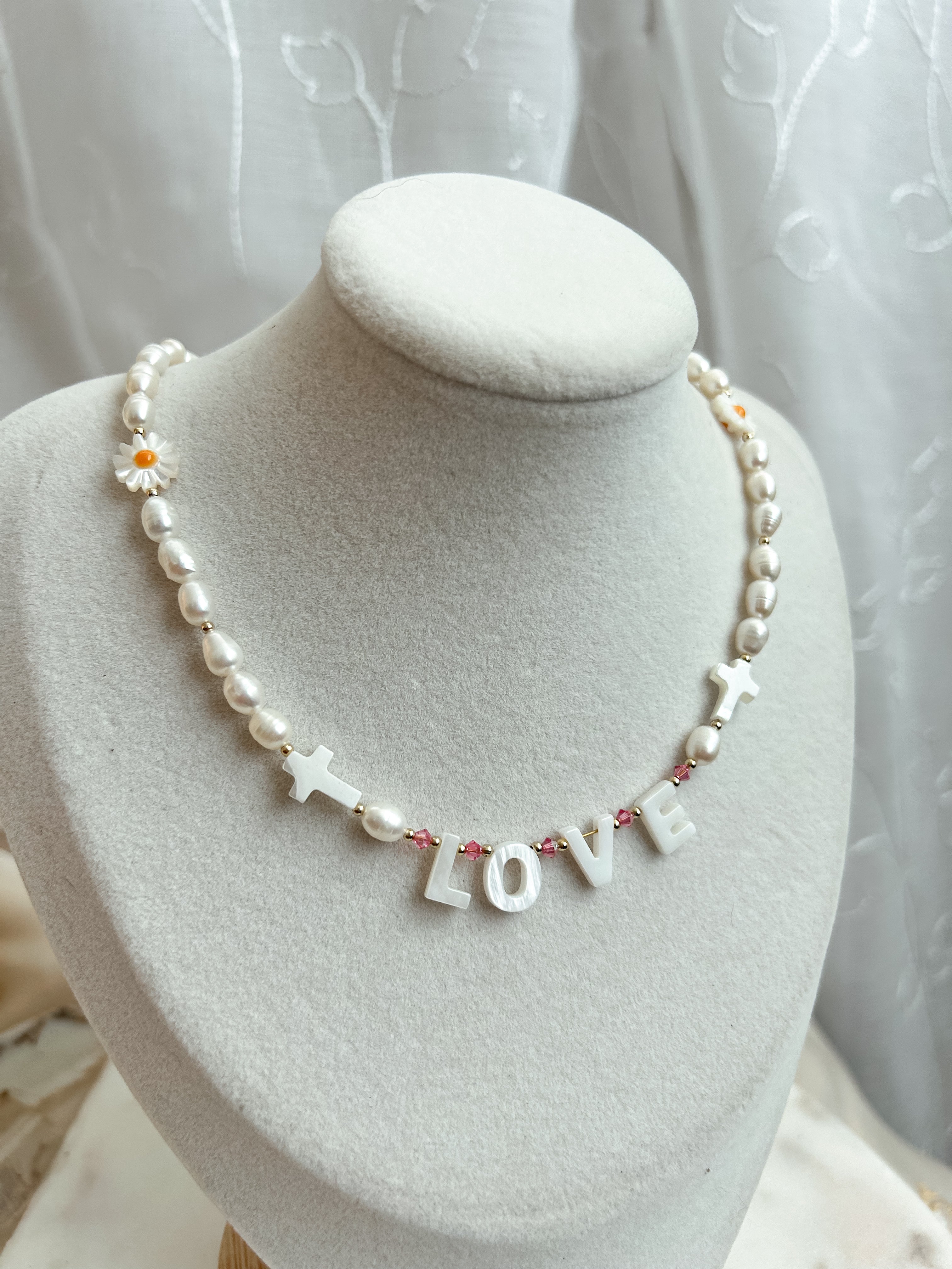 Tying love around my neck Uniquely Chosen Boutique LLC